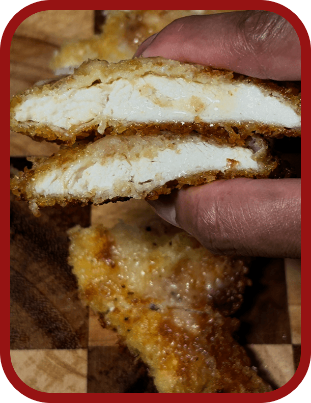 crispy-parmesan-chicken-cutlets-served-warm-with-fresh-lemon-wedges crispy-parmesan-chicken-cutlets-served-warm-with-fresh-lemon-wedges